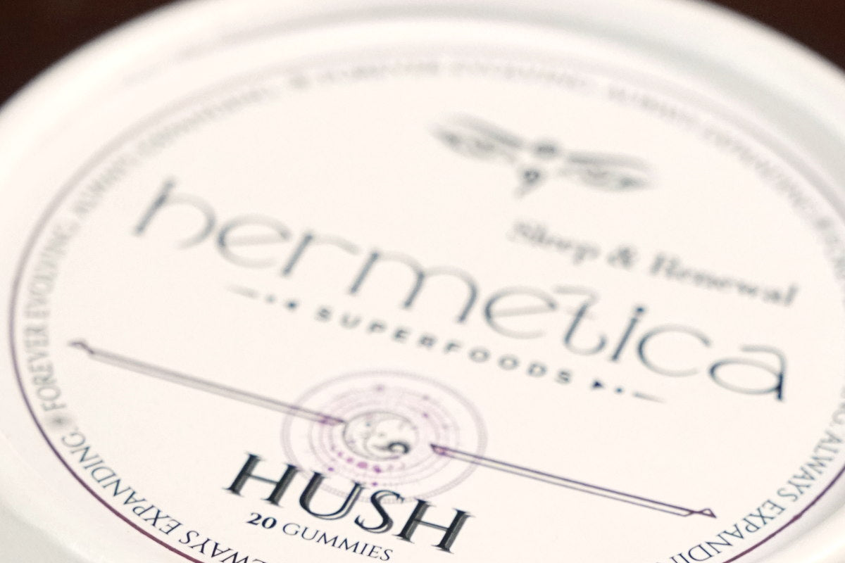 Hush Sleep Gummies tin on marble