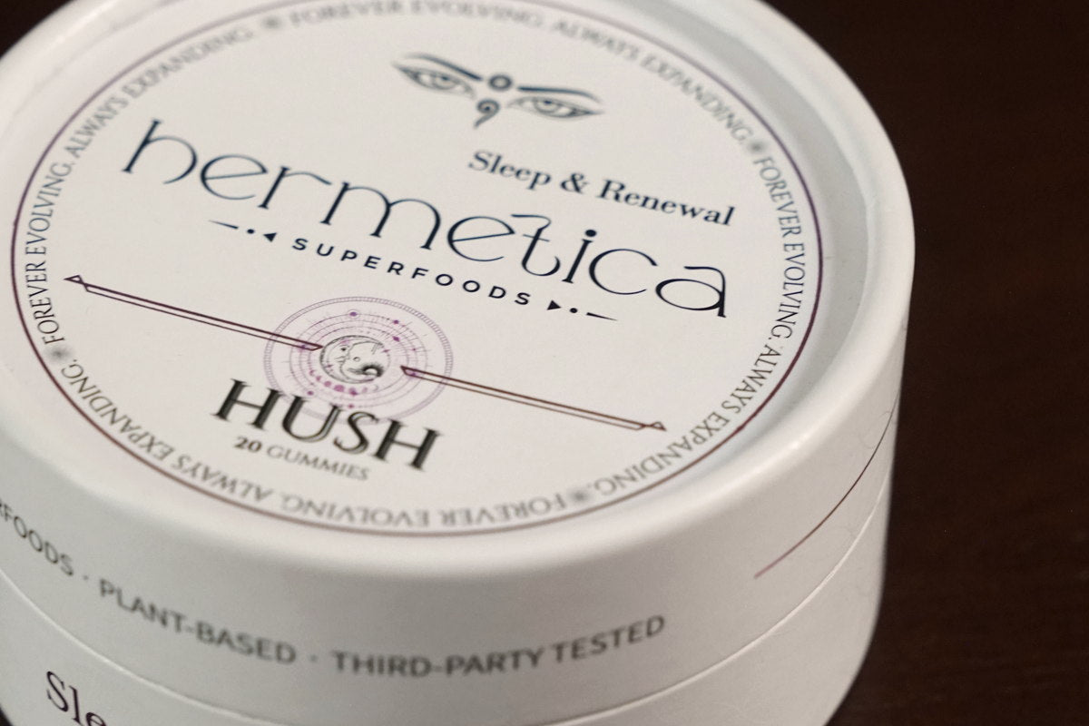 Open tin of Hush Sleep Gummies