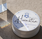 Hush sleep gummies tin in natural sunlight