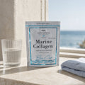 Blue Crush Marine Collagen Gummies pouch on pale limestone at a luminous coastal vanity