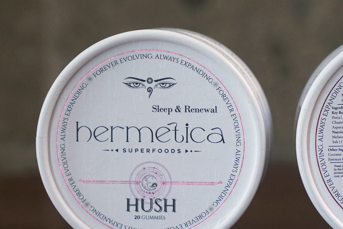 Open tin of Hush Sleep Gummies