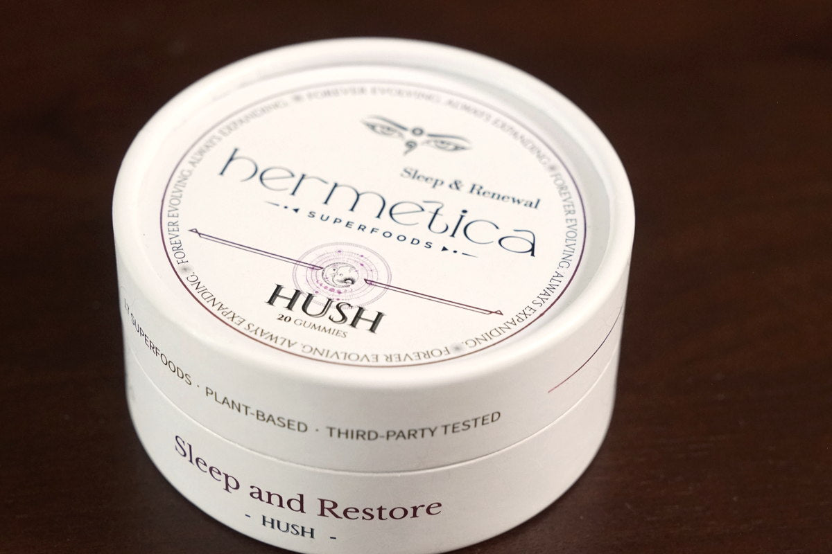 Open tin of Hush Sleep Gummies