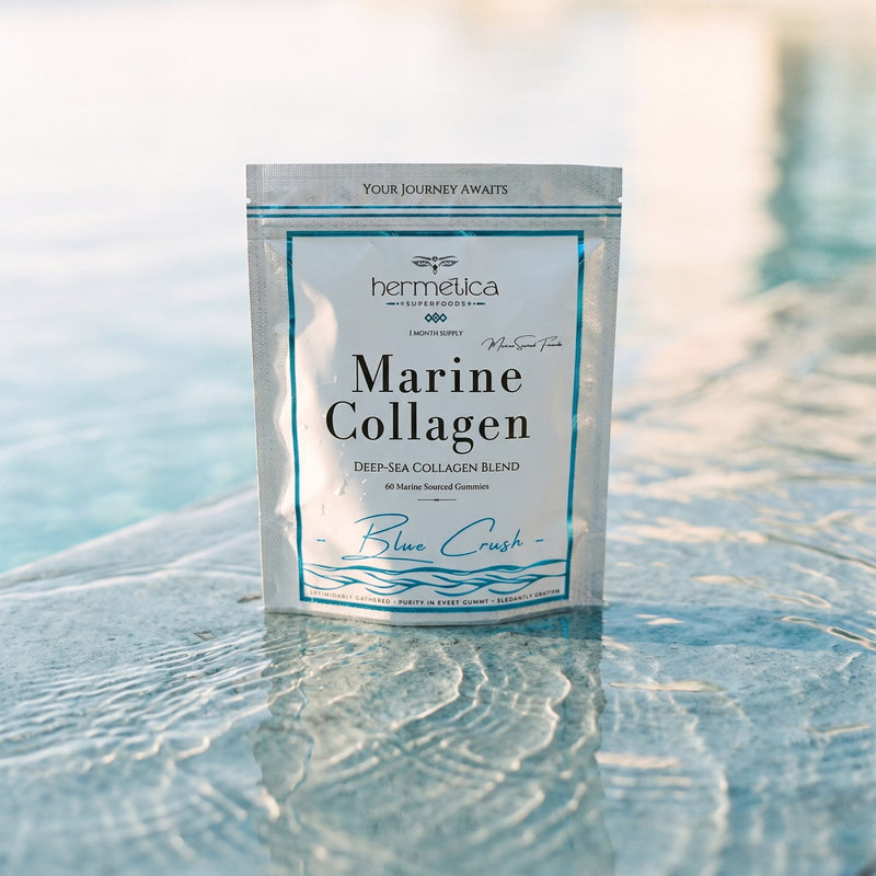 Blue Crush Marine Collagen pouch on wet blue stone with rippling water and soft light