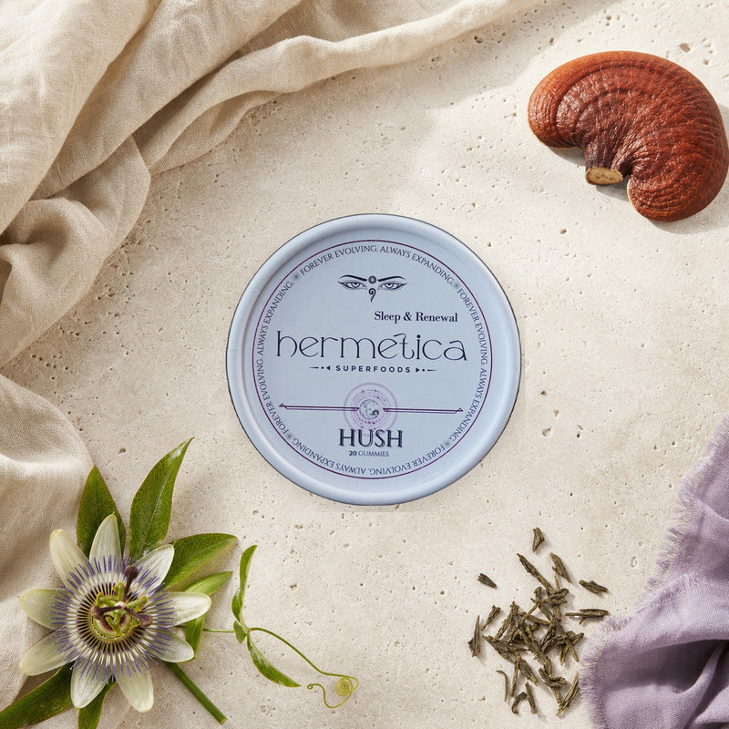 Hush with reishi, passion flower, and tea leaves representing its active formula