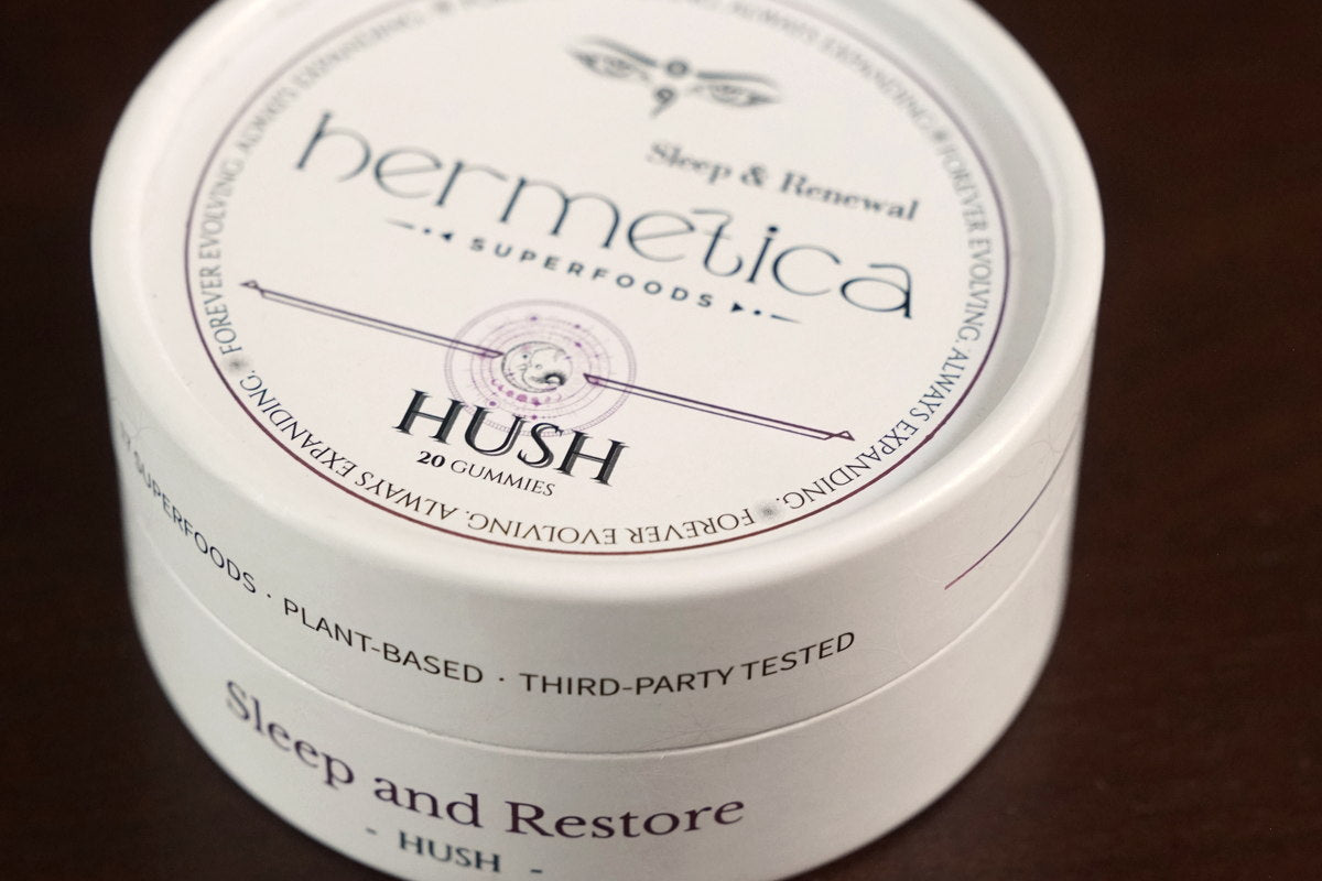 Hush vs. LullaBites label comparison — calm bedside scene with sleep gummies at dusk