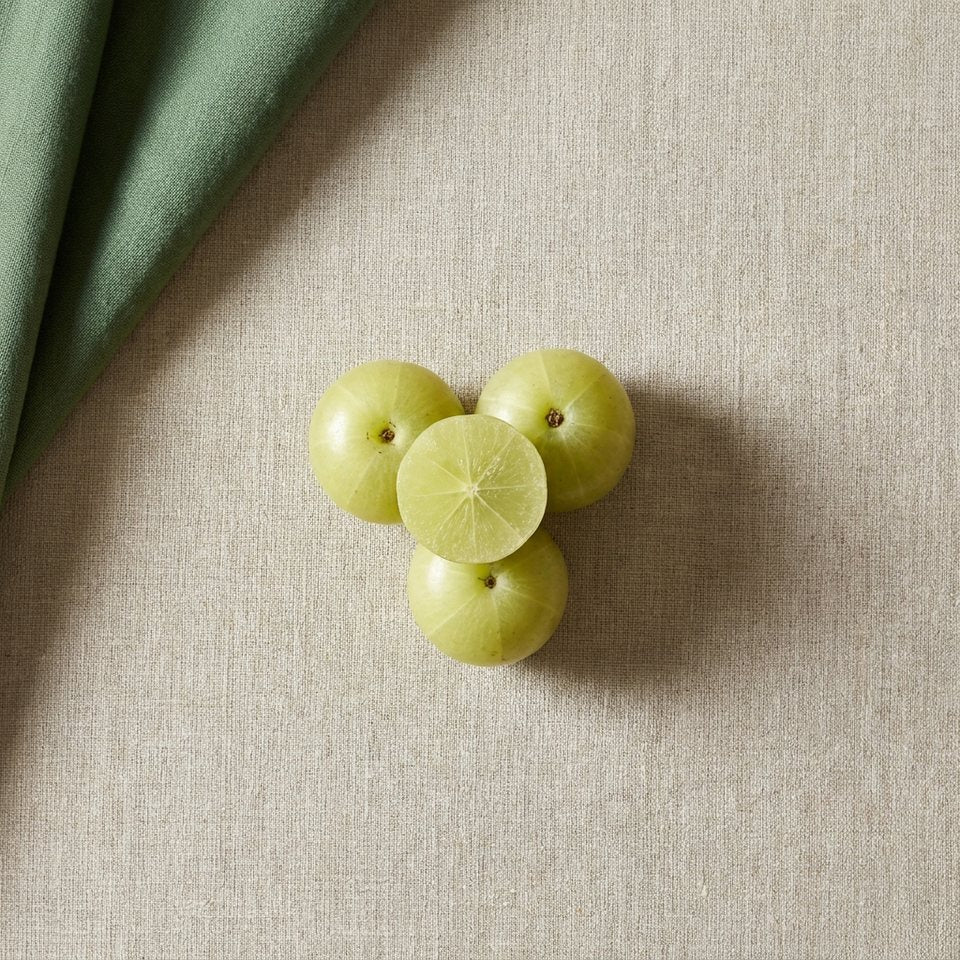 Amla fruits, one cut open