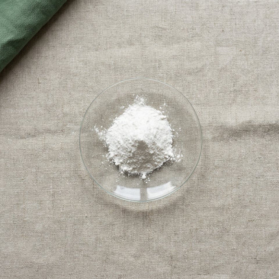 Hyaluronic acid powder on a glass dish