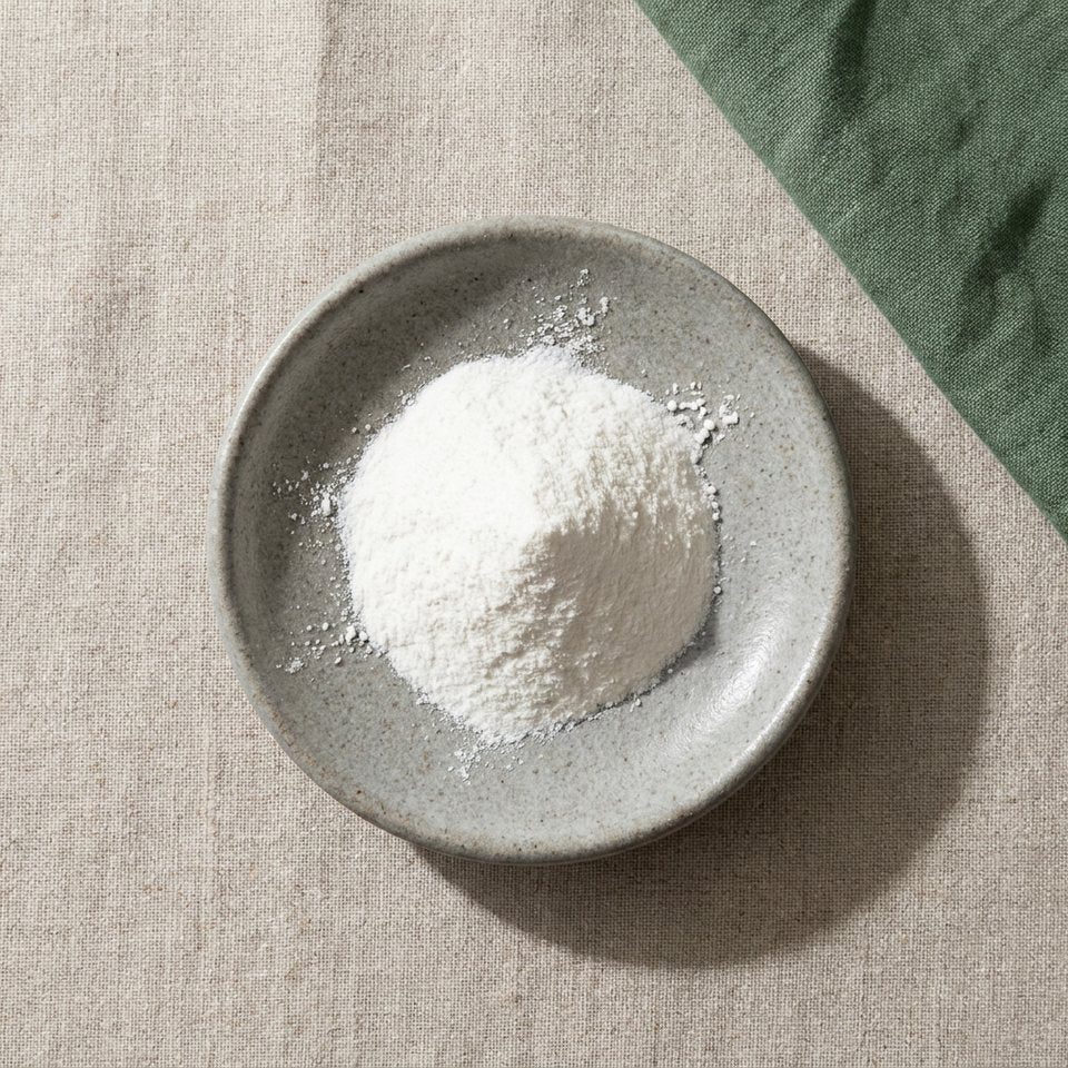 L-theanine powder in a small stoneware dish