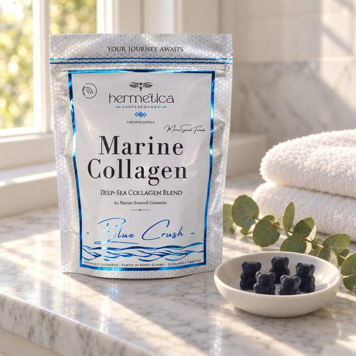Blue Crush Marine Collagen pouch on a light oak table in morning light with eucalyptus and water