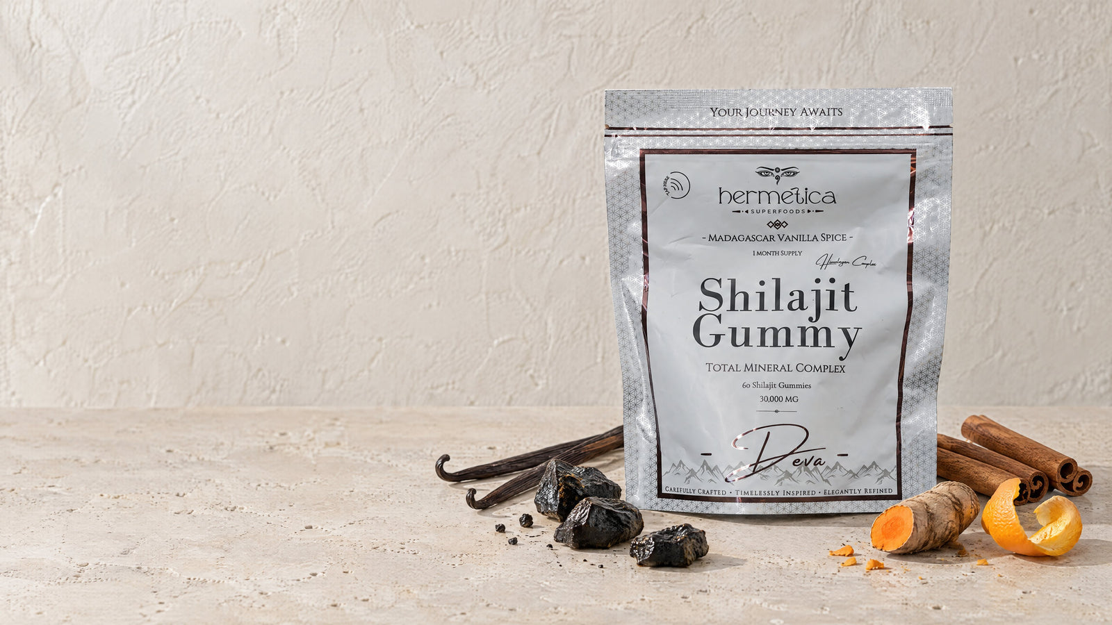 Deva pouch on pale stone with its ingredients